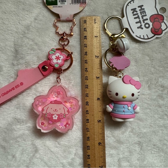Sanrio Hello Kitty and Pompompurin Keychain Bag Charm Set - Picture 3 of 4